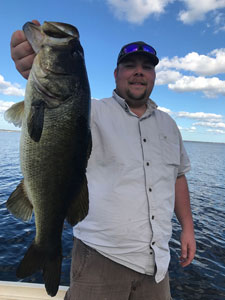 Customer fishing with Eddie Bussard - Bass Challenger Guide Service