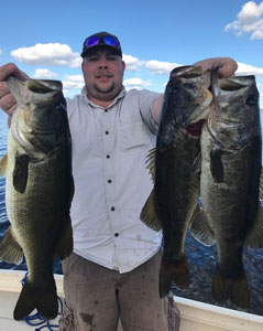 Customer fishing with Eddie Bussard - Bass Challenger Guide Service