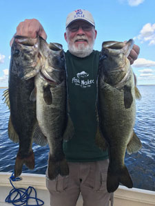 Customer fishing with Eddie Bussard - Bass Challenger Guide Service