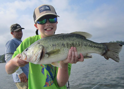 Happy fisherman with his summertime catch