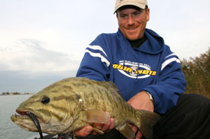 Bronzeback enemy number one, Joe Balog, fan-casts sandbars – especially where birds are seen feeding on shiners and shad