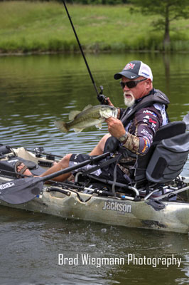 Bill McDonald fishing from a kayak