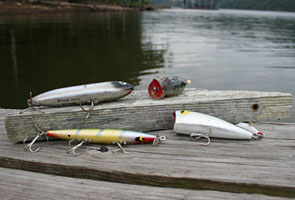 Heddon Zara Spook, Arbogast Hula Popper, Rbel Pop-R, and Smithwick Devil's Horse